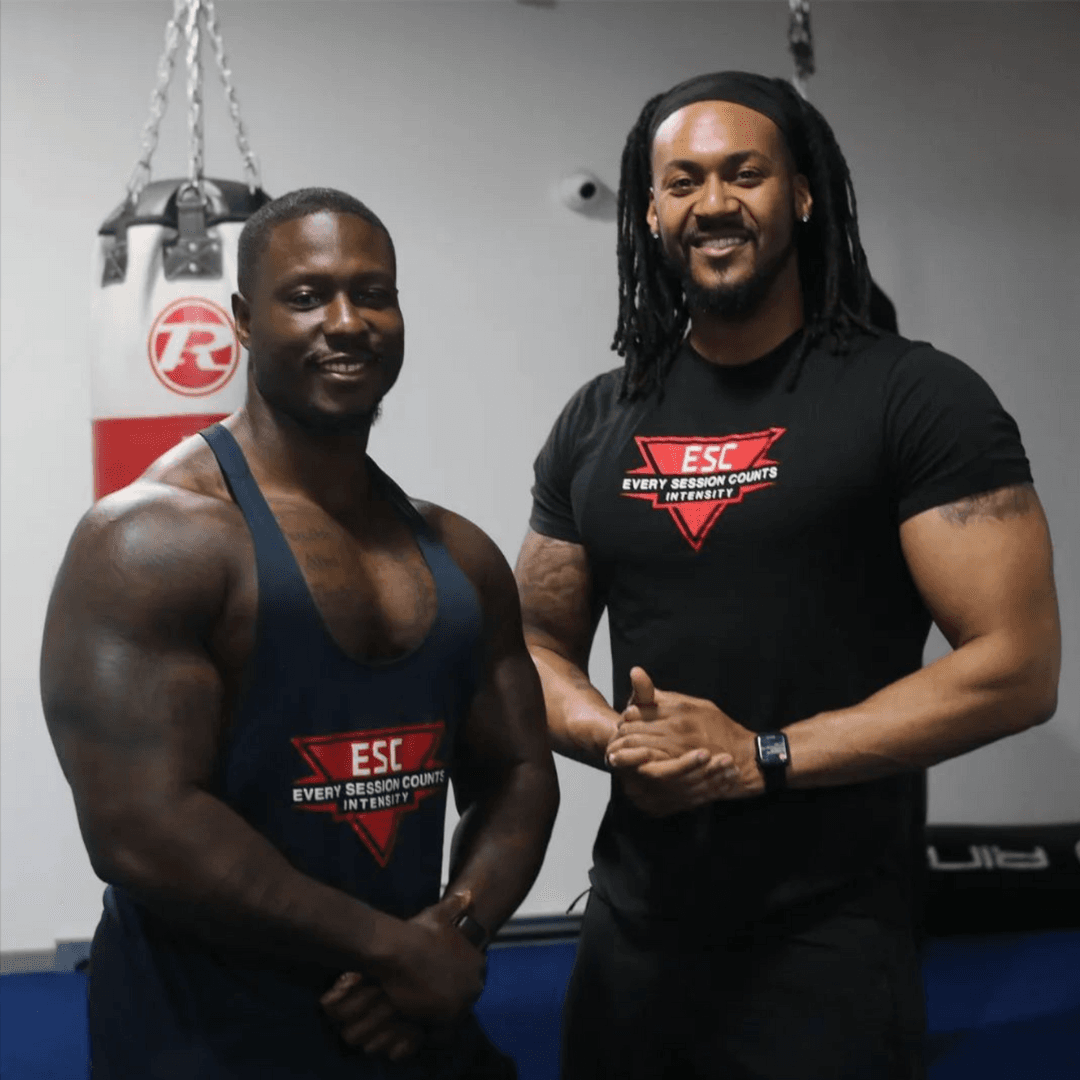 ESC coaches, Joel and Craig standing side by side